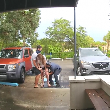 Midwife Aids Baby Delivery in Parking Lot